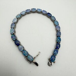 7" Stunning 5x7mm Opal cabochon doublet tennis bracelet in sterling silver!